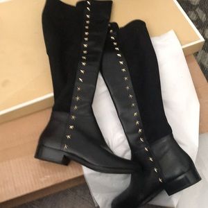 New in box , back are stretch material, gold stars over the knee boots